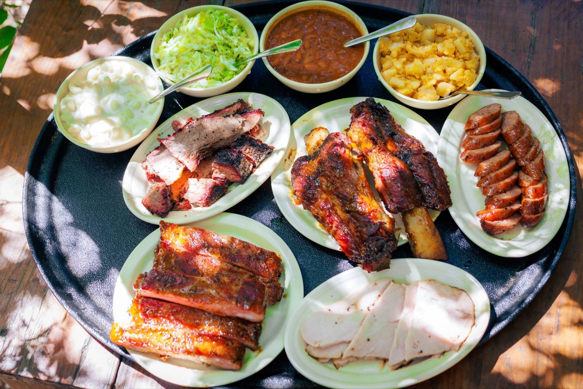 Texas barbecue spread of brisket, ribs, sausage, turkey and sides