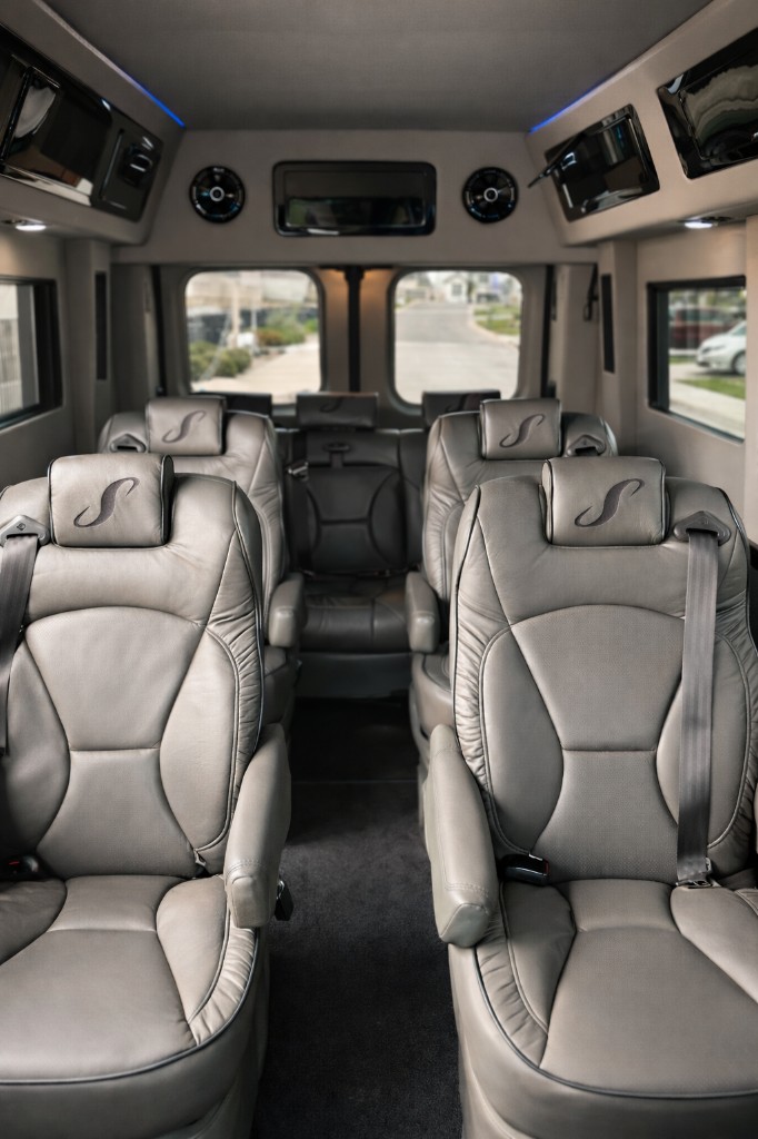 Premium leather interior with captain's chairs for executive configuration wine touring